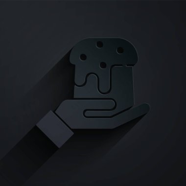 Kağıt kesiği İnsan eli ve siyah arka planda izole edilmiş Paskalya pastası ikonu. Mutlu Paskalyalar. Kağıt sanatı tarzı. Vektör İllüstrasyonu