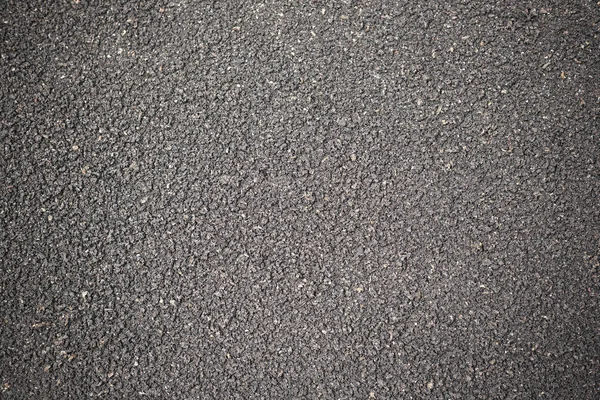 Old asphalt road texture background.