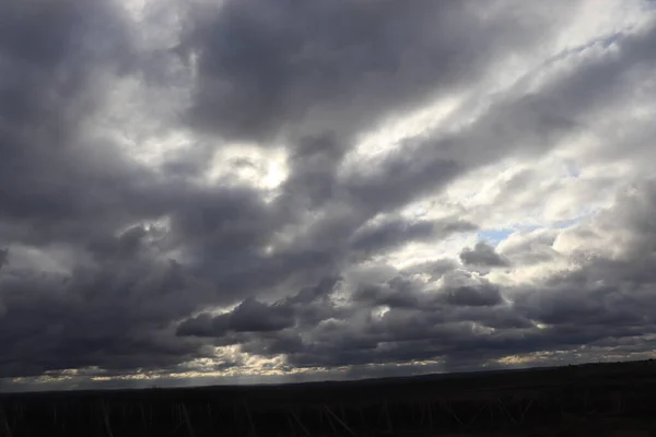 Winter Cloudy Sky Dark Clouds Very Little Sun — Stock Photo, Image