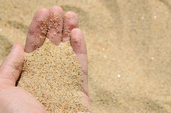 Sand Hand Macro Stock Picture