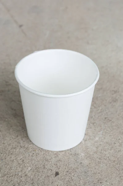 Empty white paper cup isolated on white.  White cup for product.