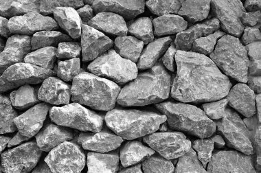 Taş duvar kağıdı gibi büyük ve küçük taşların arkaplanı