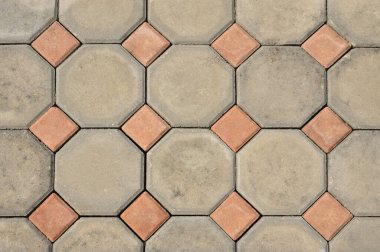 Yürüyüş yolunda beton blok deseni var. Sokak arka planı. Taş tuğla dokusu