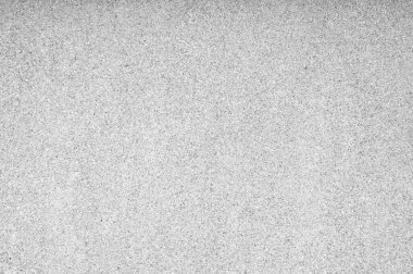 Yıkanmış kum dokusu ve arka plan. Duvar, çimento harcı ile karıştırılmış kum temizleme kabuğundan yapılmıştır. Siyah ve Beyaz tonu