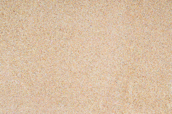 Washed sand texture and background. Wall made from fine and coarse sand washing mix with cement mortar. Stone wall fence background.