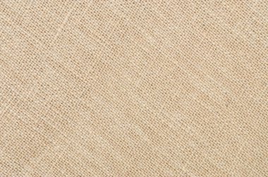 Arka plan için doğal çuval bezi. Sanat çalışması için kahverengi çuval dokusunun yakınlaştırılması