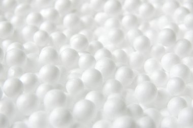 Beyaz köpük topları arka planı. styrofoam yüzey dokusu.