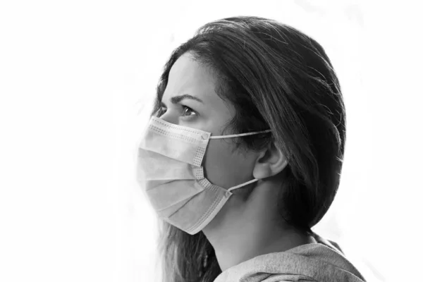 black and white woman wearing an anti virus protection mask to prevent others from corona COVID-19
