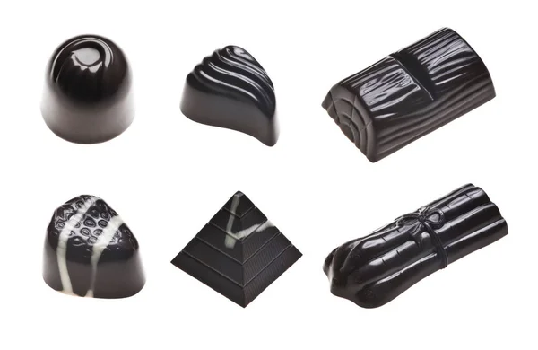Luxusní Čokoládové Lanýže Rozmanité Lahodné Ručně Vyráběné Pralinky Řadě Izolované — Stock fotografie