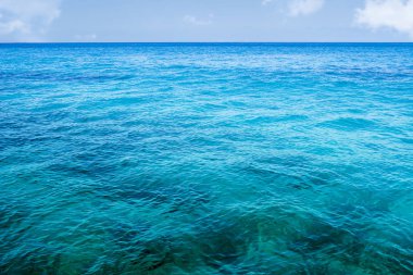 mediterranean clear water turquoise aquamarine sea and blue sky travel vacancies Balearic Islands