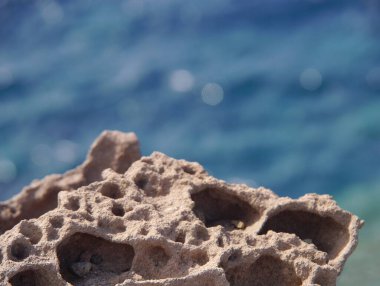 Views of the caldera, mountains, the Mediterranean Sea, and the city of Fira from the Akrotiri Lighthous, Santorini island Greece.