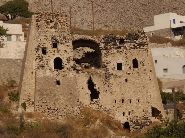 Emporio, the largest village of Santorini island, Greece.  Abandoned houses and historical Typical buildings and streets of the old part of the village.