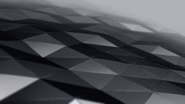 黒の背景にガラスから滑らかな多角形の表面を振って灰色のアニメーションと抽象的な背景 シームレスなループのアニメーション — ストック動画