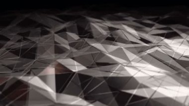Siyah zemin üzerindeki camdan pürüzsüz çokgen yüzey sallayan koyu altın renkli animasyon ile soyut arkaplan, pürüzsüz döngünün animasyonu 