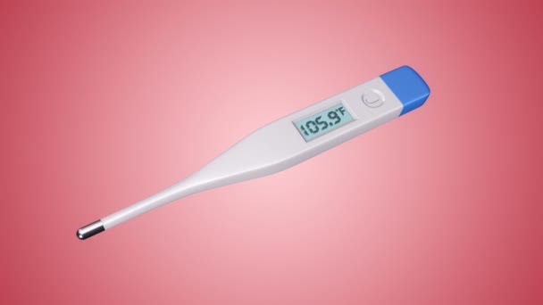 ピンクの背景に可変温度のデジタル医療用温度計のアニメーション シームレスループのアニメーション — ストック動画