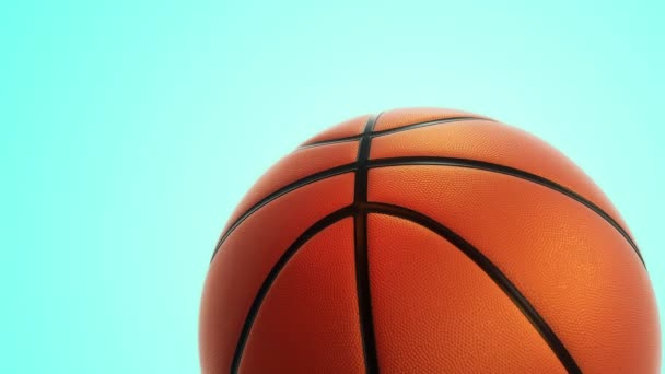 Анимация Медленного Вращения Оранжевого Мяча Баскетбола Реалистичной Текстурой Светом Синем — стоковое видео