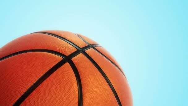Анимация Медленного Вращения Оранжевого Мяча Баскетбола Реалистичной Текстурой Светом Синем — стоковое видео