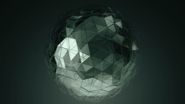 滑らかな多角形の表面を持つガラス球の濃い緑色のアニメーションを持つ抽象的な背景 シームレスなループのアニメーション — ストック動画