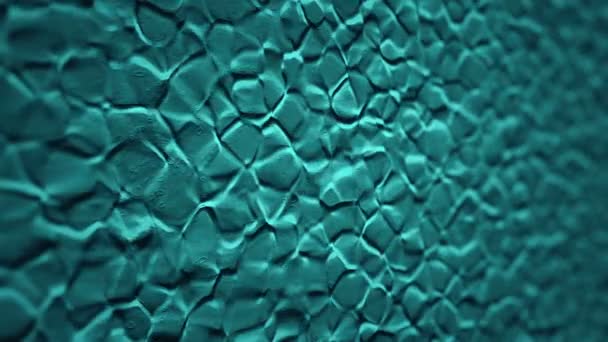 Fond abstrait avec animation des ondulations turquoise en surface organique, Animation de boucle transparente 