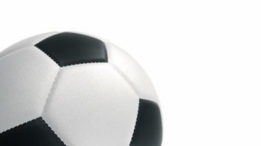 Futbolun gerçek deri dokusuyla topu arka planda döner. Kusursuz döngünün animasyonu.