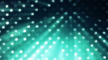 Işık huzmesi projektörlü parlak lambalardan çıkan turkuaz duvarlı soyut bir arkaplan. Kusursuz döngünün animasyonu