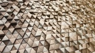 Altın üçgenlerin dalga mozaiğinin animasyonuyla soyut teknolojik arka plan, kusursuz döngünün animasyonu.