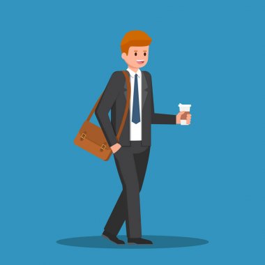 Kahve fincanı elinde tutan işadamı.