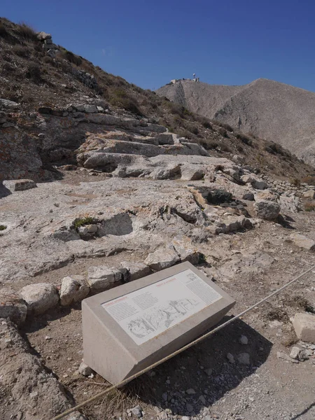 Tehra, Mesa Vouno, Santorini / Greece - October 7, 2018: The ruins of the ancient city of Tehra on the plateau of Mesa Vouno mountain, on the island of Santorini. 