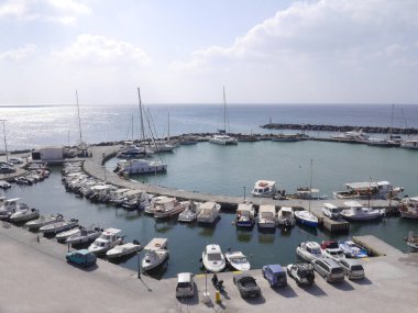 Vlychada, Santorini / Greece - October 11. 2018:  View of the pier with yachts, boats, ships.