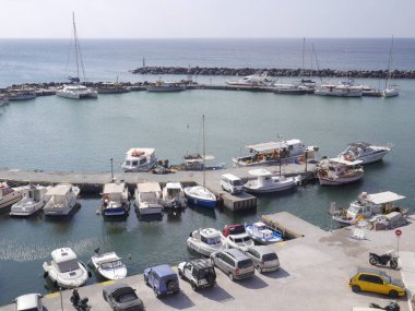 Vlychada, Santorini / Greece - October 11. 2018:  View of the pier with yachts, boats, ships.