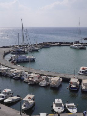 Vlychada, Santorini / Greece - October 11. 2018:  View of the pier with yachts, boats, ships.