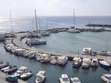 Vlychada, Santorini / Greece - October 11. 2018:  View of the pier with yachts, boats, ships.