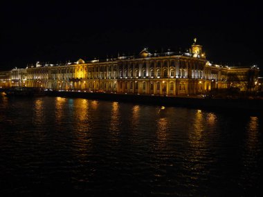 Saint-Petersburg / Russia - 05.07.2018: View from the bridge to the Hermitage, the Winter Palace at night. 