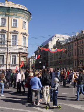 St. Petersburg / Russia - 05.09.2018: People walking in the center of St. Petersburg on May 9 holiday.