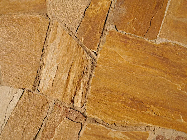 Ocker Goldmauerwerk Aus Steinplatten Hintergrund Textur — Stockfoto
