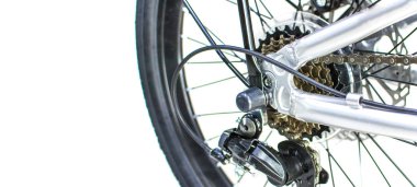 Close up wheel and chain of mountain biking. Landscape view of disc break system and front Derailleur of moutain bike. bicycle parts titanium color and frame aluminium. Shift lever and brake lever.