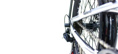 Close up wheel and chain of mountain biking. Landscape view of disc break system and front Derailleur of moutain bike. bicycle parts titanium color and frame aluminium. Shift lever and brake lever.