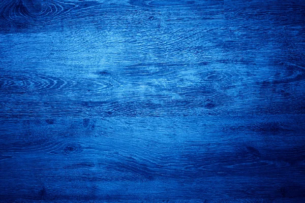 Textura de madeira com padrão de madeira natural para design e decoração. Fundo de madeira marrom escuro. Tendência cor azul clássico. Cor de 2020. Principais tendências do ano. Tintura criativa azul . — Fotografia de Stock