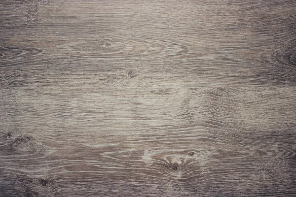 Wood texture with natural wood pattern for design and decoration. Dark brown wood background. Natural teak wood background. laminate parquet floor texture background. Wood texture for design.