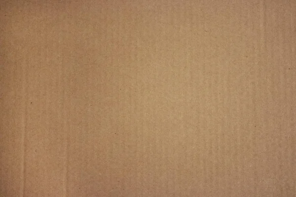 Brun en carton ondulé texture utile comme fond. Texture carton. Texture de papier artisanal en carton. Gros plan de la texture du carton . — Photo