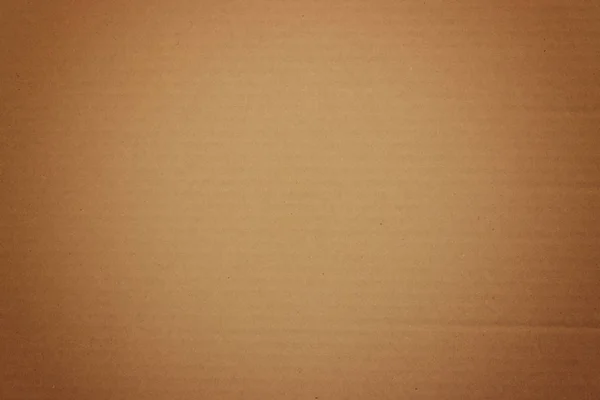 Textura de papelão ondulado marrom útil como fundo. Textura de papelão. Textura de papel artesanal de papelão. Fechar a textura do cartão . — Fotografia de Stock