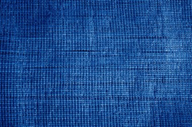 Açık kahverengi renkteki kabataslak kumaşın dokusu. Geçmişi. Moda rengi klasik mavi. 2020 'nin rengi. Yılın ana trendi. Mavi Yaratıcı Boyama.