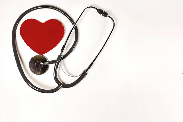 World health day, Healthcare and medical concept. Red heart with Stethoscope on white background texture