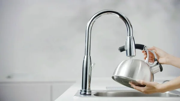 Close Young Woman Hands Washing Uplift Kettle Modern Kitchen — стоковое фото