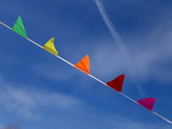 stock image flags on blue sky - festive mood