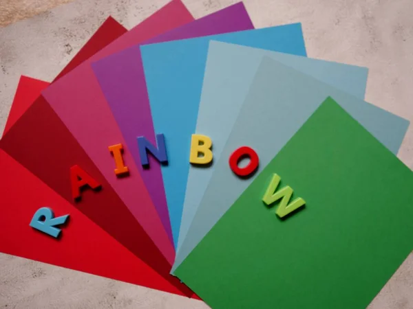 Layout Fogli Carta Colorati Sulla Superficie Sotto Forma Ventilatore Arcobaleno Fotografia Stock