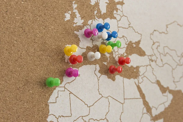 World map of cork showing European and North African areas with colored pushpins - destinations - visited places - colored pushpins marking places, Atlantic Ocean, Canary Islands, Spain