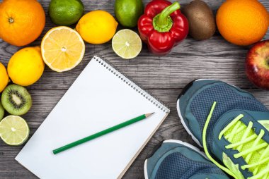 Fitness kavramı meyve ile. Üstten Görünüm arka plan kavramı. Fitness