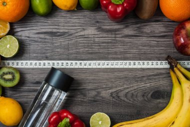 Fitness kavramı meyve ile. Üstten Görünüm arka plan kavramı. Fitness