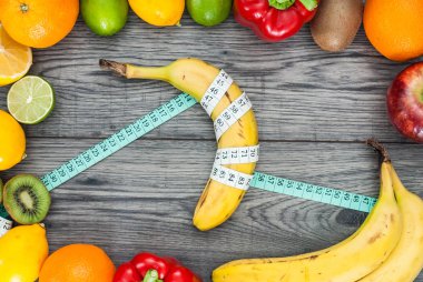 Fitness kavramı meyve ile. Üstten Görünüm arka plan kavramı. Fitness